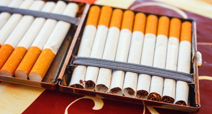 Cigarettes made with the make-your-own kit, in a case